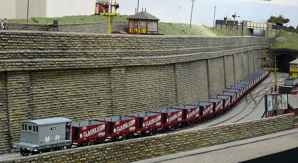 Photo of a rake of W Clarke & Son wagons on Bob Essery's Dewsbury Goods layout.