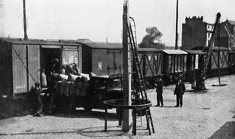 Photo of Loading New Potatoes At Tyndall Street Station, Cardiff.